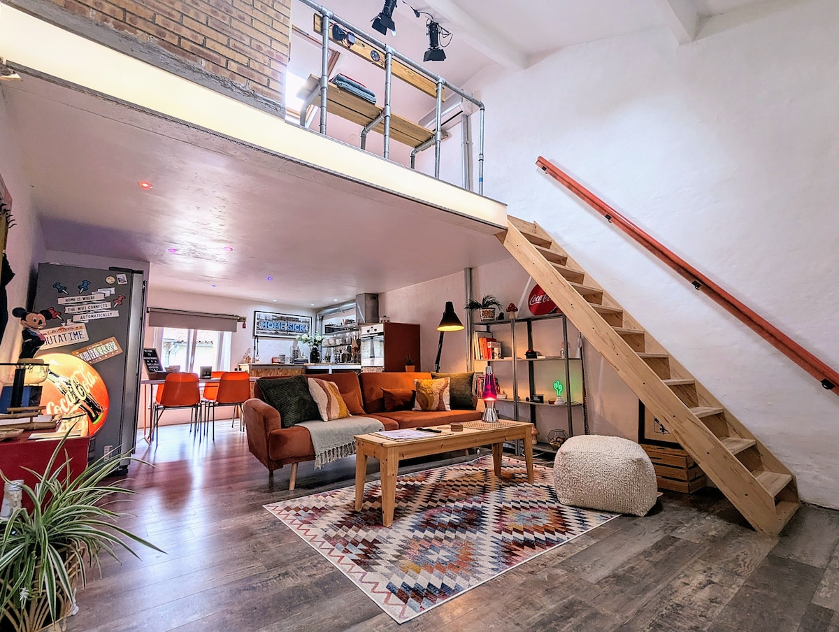 The open-plan living space at Garage Number 9